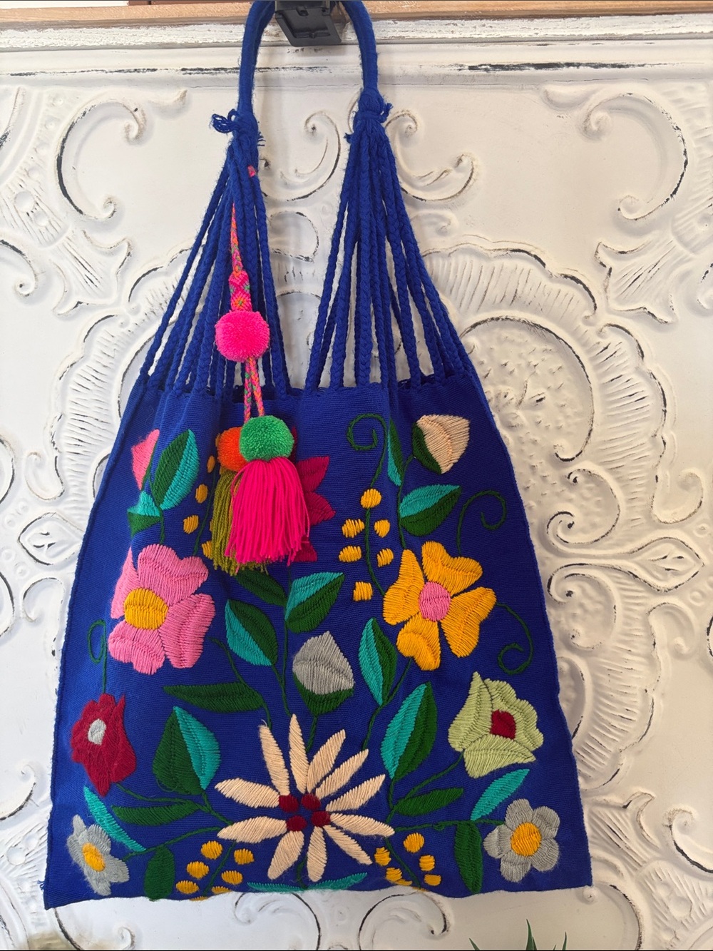 Hand-Embroidered Royal Blue Floral Tote with Tassel Accent